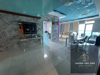The most beautiful and luxurious two-bedroom apartment with a living room, fully furnished, with free air conditioning provided by the owner, and a se