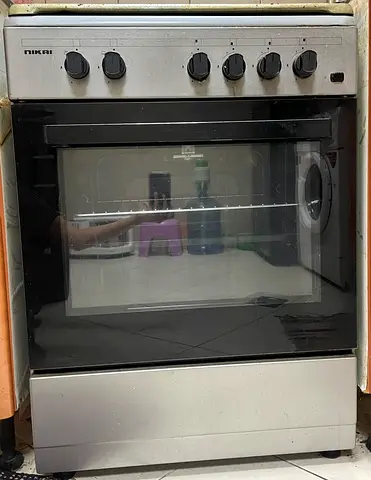 Urgent Sale- Nikai 4 Burner Gas Cooker with Oven – Excellent Working Condition (Moving Out Sale)