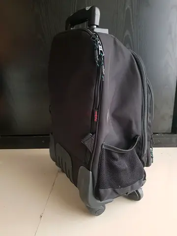 Wheeled black backpack / small trolley bag
