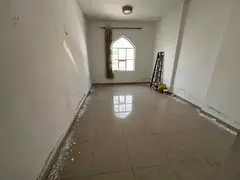 Spacious one-bedroom apartment with central air conditioning, second row from Ajman Corniche, easy a