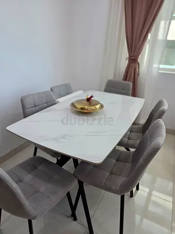 6-Seater Marble-Top Dining Table with Upholstered Grey Chairs
