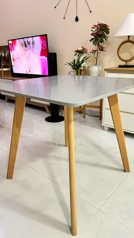 Modern Scandinavian-style Dining Table with Wooden Legs (Good Condition)