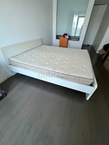 Excellent condition (Ikea brand) King size bed with high quality mattress for quick sale.