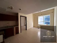 Luxury 1BR apartment in Garden City Towers, Al Hamidiya. Prime location near Ajman Court, open kitch