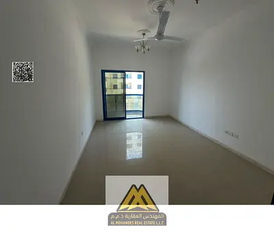 1 bedroom hall in Ajman Industrial 2, central AC, balcony, separate hall, parking, AED 30,000 yearly, 4 or 6 payments.