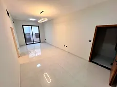 Brand-new 2-bedroom apartment for annual rent in Al Alia, Ajman, near Bait Al Muttahid.