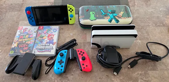 Nintindo Switch + 3 Games + Case| UAE Full accessories