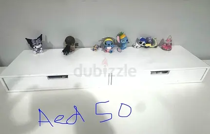 Shelving unit with drawer