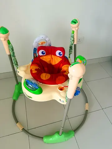 Baby Jumper / Activities with music  with Seat and Toys - perfect Condition