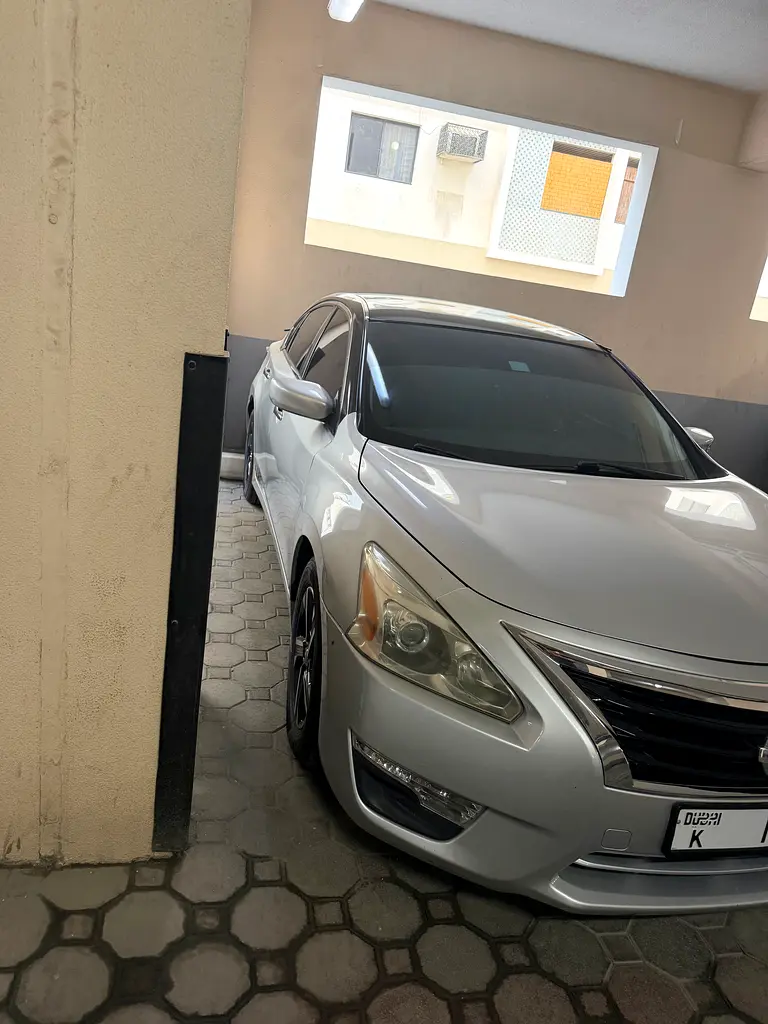 Nissan Altima 2015 — photo 1 of 7