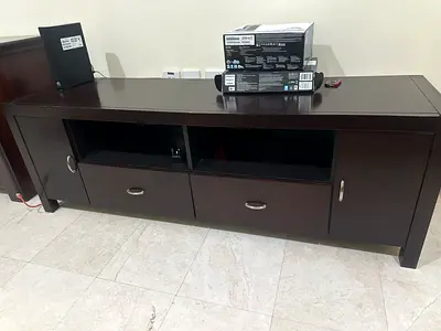 Dark Wood Entertainment Center with Drawers and Shelves