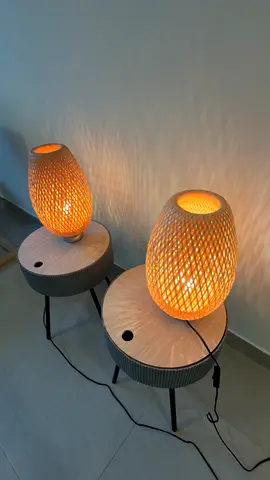 Pair of woven bedside/table lamps with wooden tripod side tables