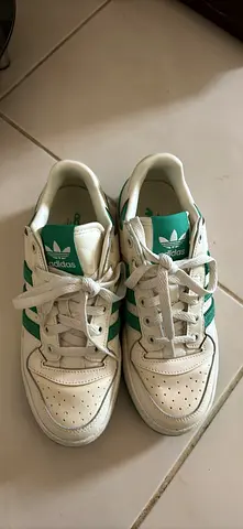 Adidas white  green sneakers, size unknown  good condition