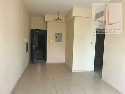 One bedroom and living room for annual rent in Ajman, Al Rashidiya 3 area. Prime location, spacious, and reasonably priced.