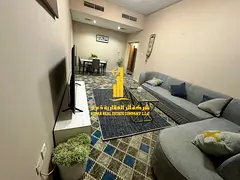 Luxury two-bedroom apartment with a living room and balcony. Ajman, Al Rashidiya 3. Fully furnished,
