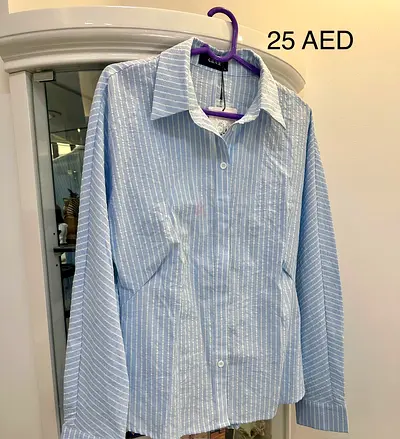 Light blue striped long-sleeve shirt - size M