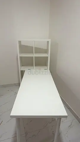 White desk with attached 4-cube shelving unit — sturdy and simple