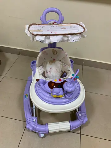 Lightweight baby walker with removable activity tray - used, good condition