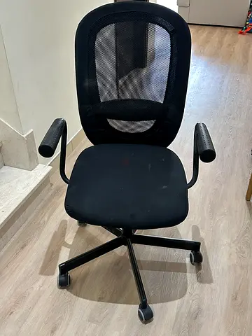 Black ergonomic mesh office chair with armrests