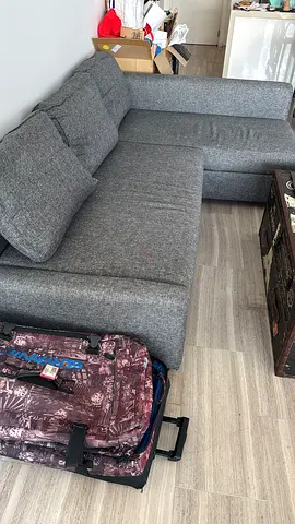 IKEA brand Sofa bed L shaped, with storage for quick sale.