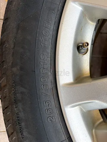 5x Yokohama Geolandar G015 – 265/60R18 + Pajero OEM Wheels