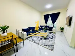 Furnished one-bedroom apartment for monthly rent in Ajman, Al Rashidiya 3 area - near Grand Mall ✔