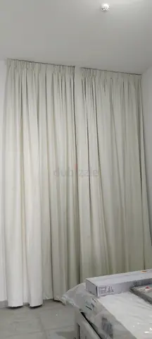 Full-length cream blackout curtains - pair