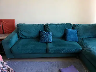 L-shaped teal fabric sofa — good condition, 3-seater corner couch