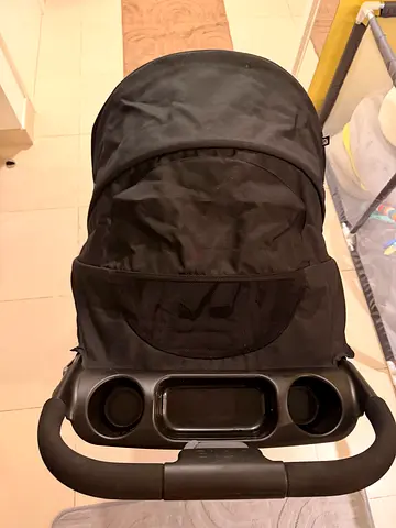 Black single stroller with parent tray and canopy - good condition