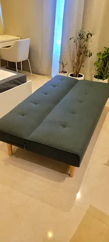 Convertible sofa bed / daybed in dark grey fabric, excellent condition