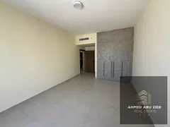 One-bedroom apartment with a living room and sea view on the Ajman Corniche; features 2 bathrooms, a