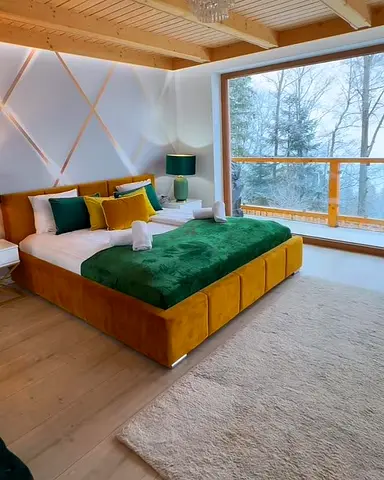 Modern upholstered king-size bed frame in mustard velvet