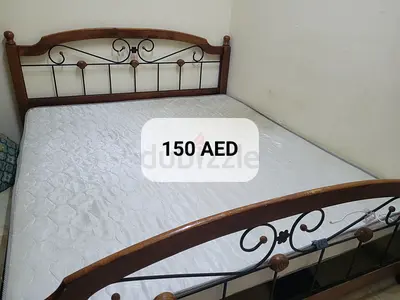 KING SIZE Wood and Metal Double Bed with Mattress for just 100 DHS