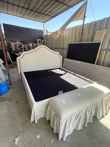 Upholstered double bed frame with headboard and storage base - cream