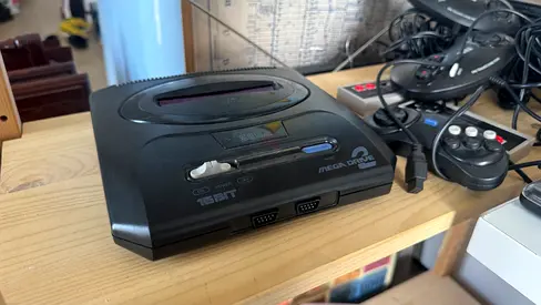 Sega Mega Drive 2 16-bit (Genesis) console with controller