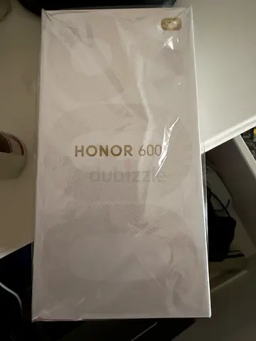 Honor 600 golden white TDRA 256gb 8gb just ioened the box warranty 1 year 1500 dhs.