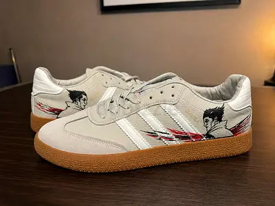 White Adidas Samba-style sneakers with gum sole and custom graphic - size available