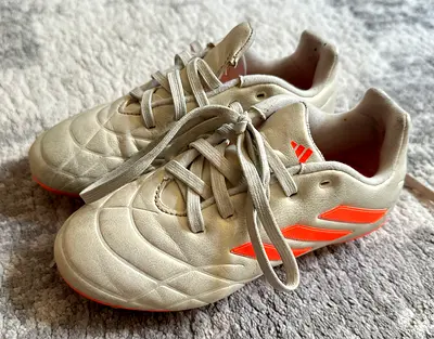 Used Adidas football boots - size not specified, beige with orange accents