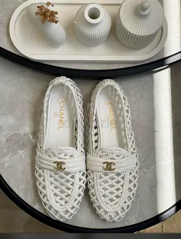 Chanel white woven logo loafers,