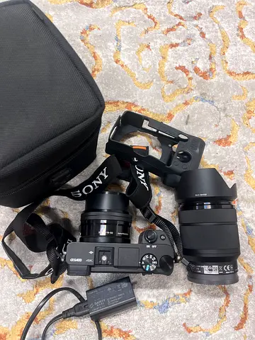 Sony a6400 with two lens 28-70mm and 16-50mm lenses charger strap lastic protection