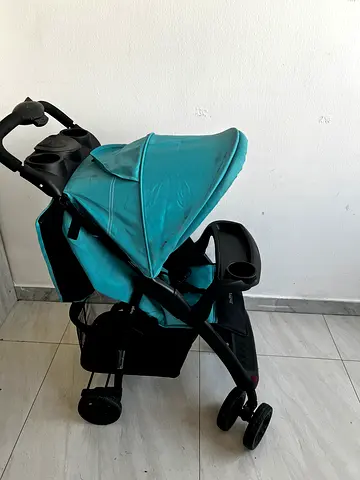 Light blue single stroller in good used condition