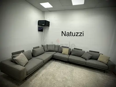 Natuzzi brand grey color sofa