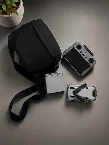DJI 4mini pro Compact drone kit with controller, spare battery and carrying bag