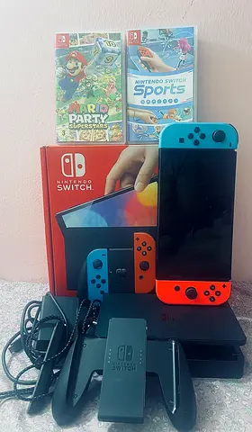 Brand New OLED NINTENDO SWITCH with joycon +2 free games