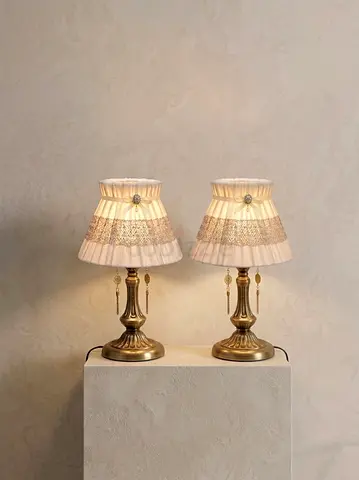 Pair of vintage brass table lamps with fabric shades