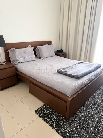 Queen wooden bed frame with mattress and bedside tables - dark brown