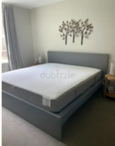 ikea malm king bed with ikea firm mattress   having 2 storage units under the bed