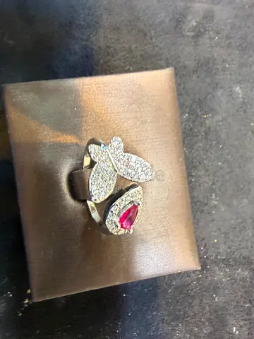Silver butterfly ring with pink gemstone and pave stones, size adjustable