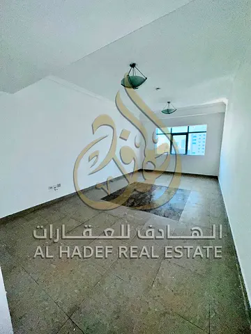 شقة غرفة وصالة مع بلكونة للإيجار السنوي في التعاون، الشارقة