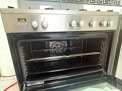 Stainless steel freestanding gas cooking with oven - Excellent condition
